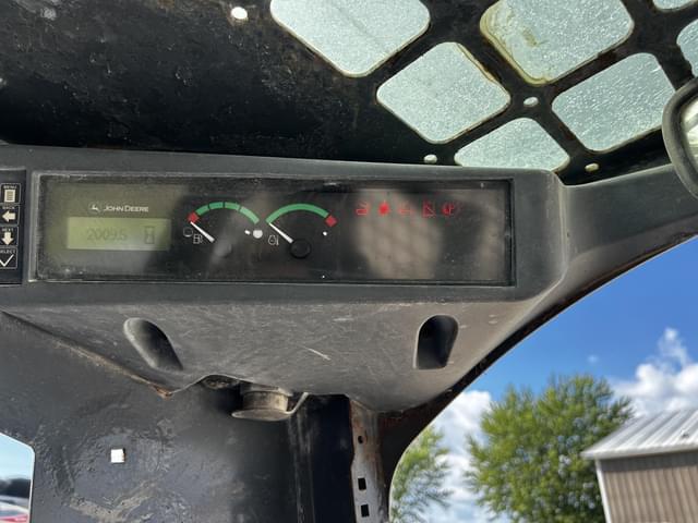 Image of John Deere 319E equipment image 4