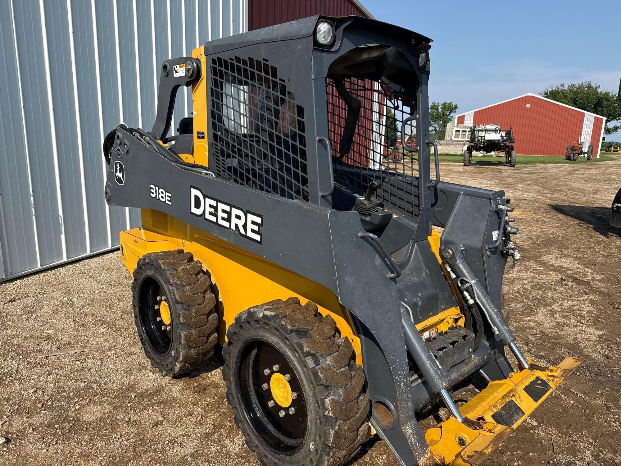 2013 John Deere 318E Equipment Image0