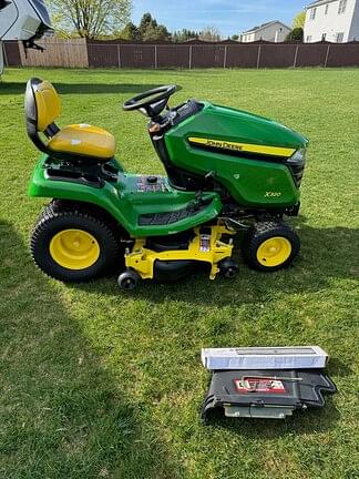 Image of John Deere X320 equipment image 4
