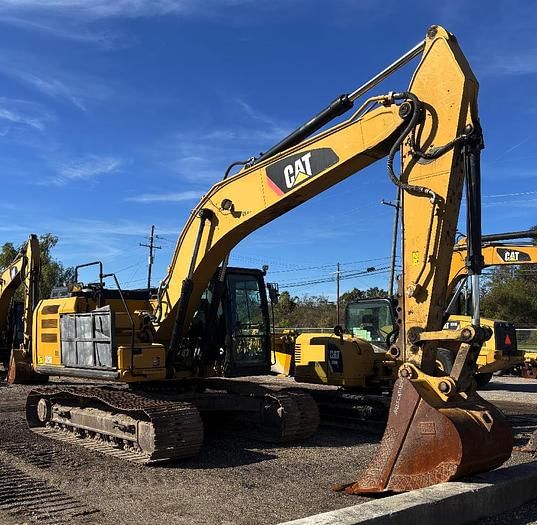 2015 Caterpillar 323FL Equipment Image0