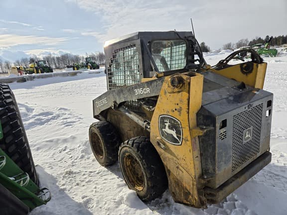 Image of John Deere 320E equipment image 4