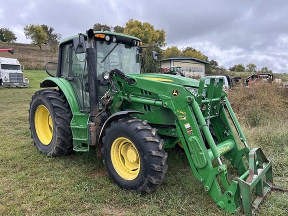 2015 John Deere 6115M Equipment Image0