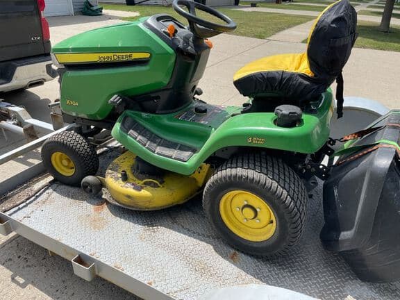 Image of John Deere X304 equipment image 2