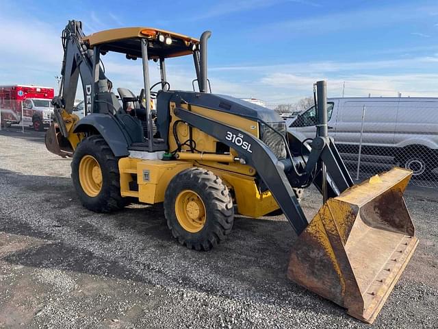 Image of John Deere 310SL equipment image 4