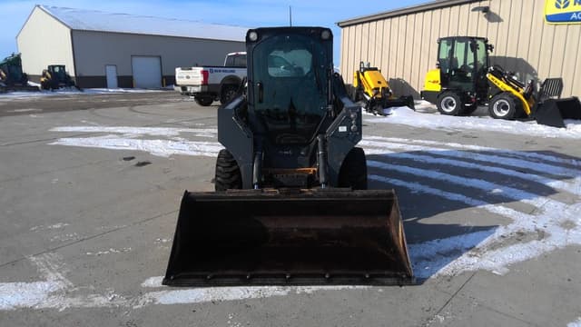 Image of John Deere 318E equipment image 4