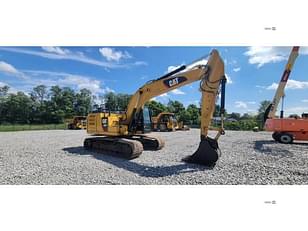 Main image Caterpillar 323FL 1