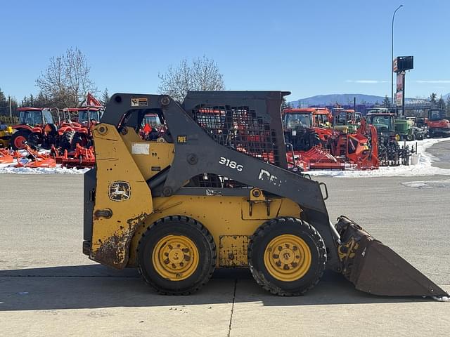 Image of John Deere 318G equipment image 4