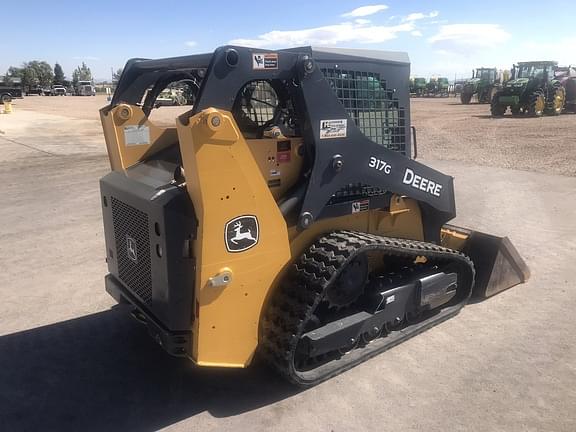 Image of John Deere 317G equipment image 4