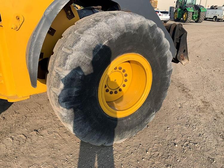 Main image John Deere 524KII 15