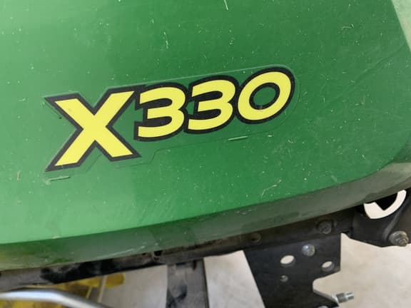 Image of John Deere X330 equipment image 4