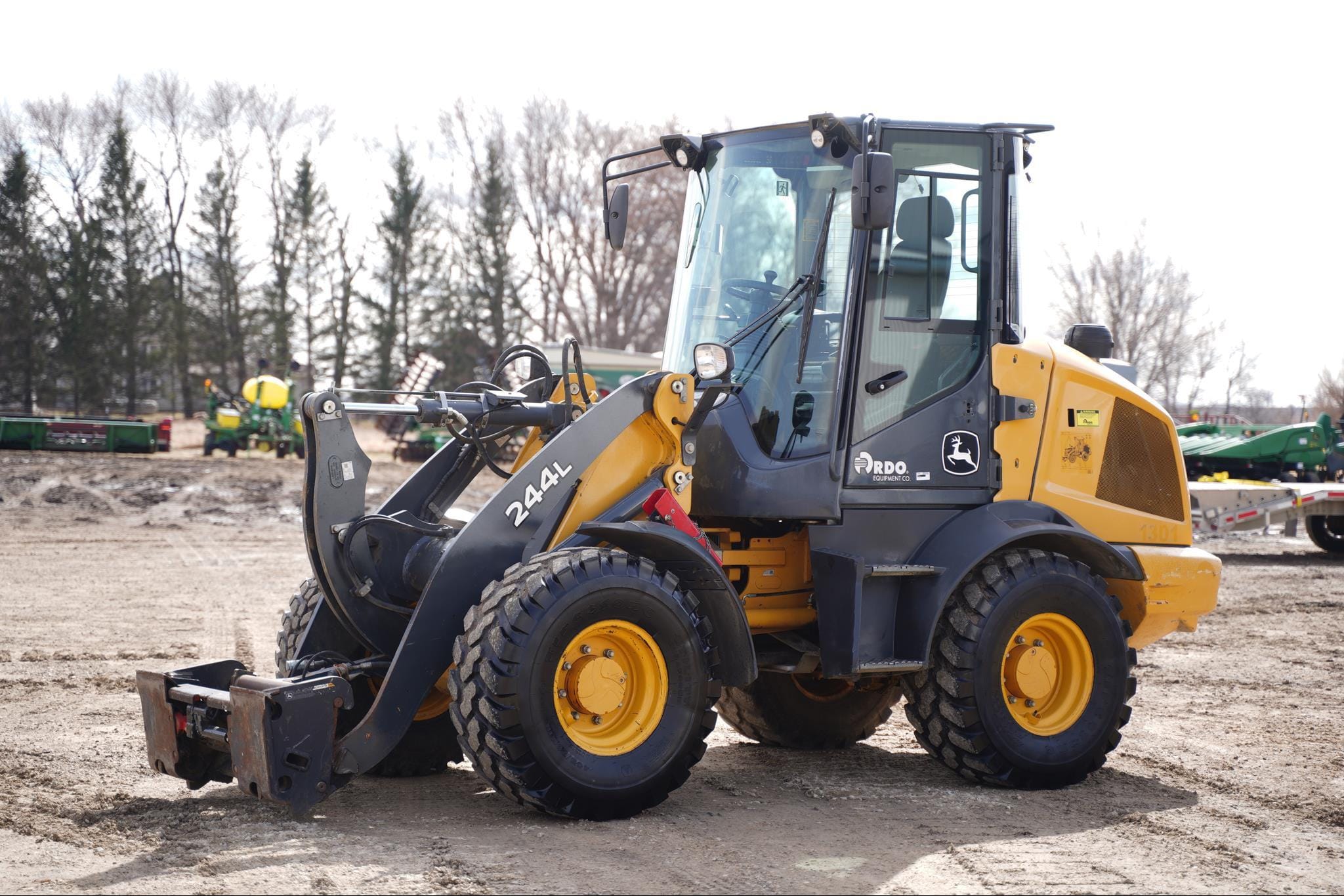 2019 John Deere 244L Equipment Image0