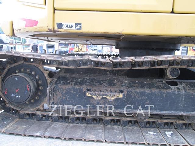Image of Caterpillar 310 equipment image 3