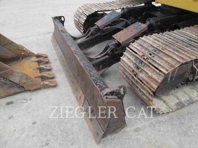 Image of Caterpillar 310 equipment image 1