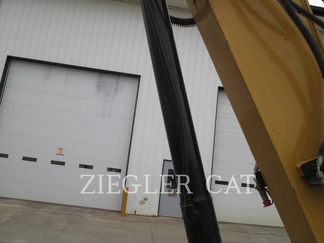 Image of Caterpillar 310 equipment image 4
