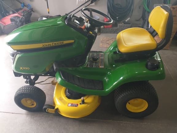 Image of John Deere X330 equipment image 4