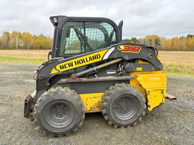Image of New Holland L318 equipment image 4