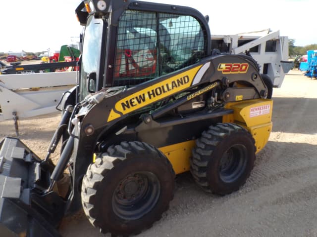 Image of New Holland L320 equipment image 4
