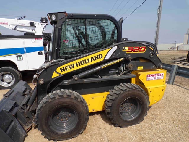 Image of New Holland L320 equipment image 4