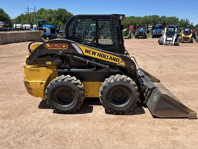 Image of New Holland L320 equipment image 4