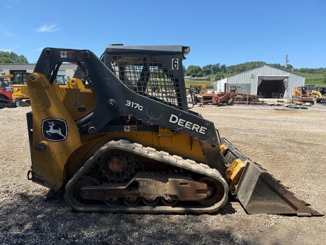 Image of John Deere 317G equipment image 4