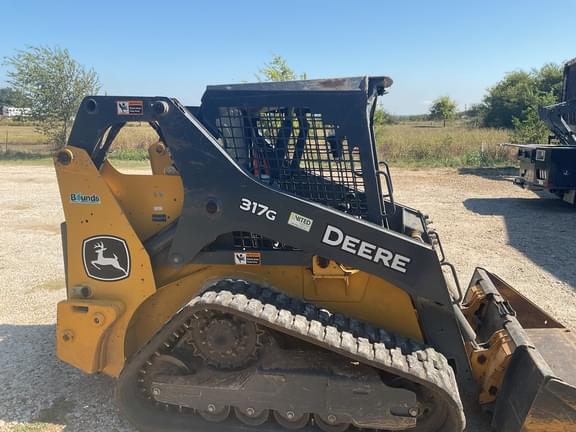 Image of John Deere 317G equipment image 4