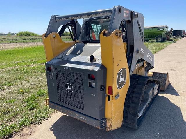 Image of John Deere 317G equipment image 4
