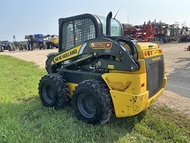 Image of New Holland L320 equipment image 4