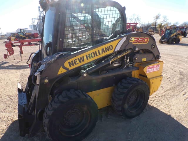 Image of New Holland L320 equipment image 4