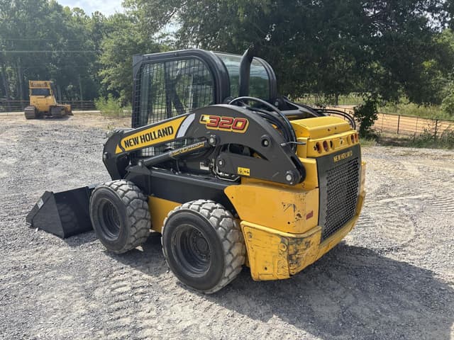 Image of New Holland L320 equipment image 4