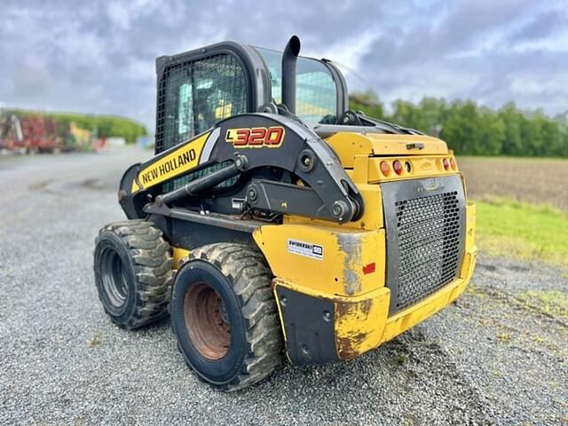 Image of New Holland L320 equipment image 4