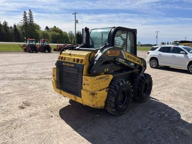 Image of New Holland L320 equipment image 4