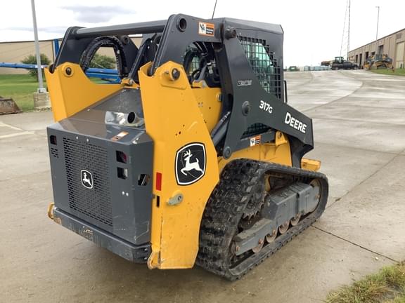 Image of John Deere 317G equipment image 4