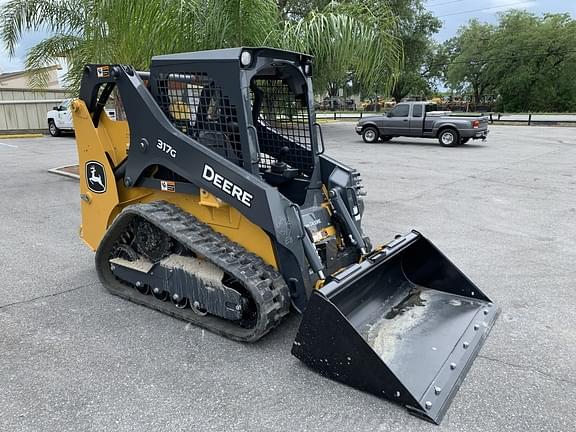 Image of John Deere 317G equipment image 4