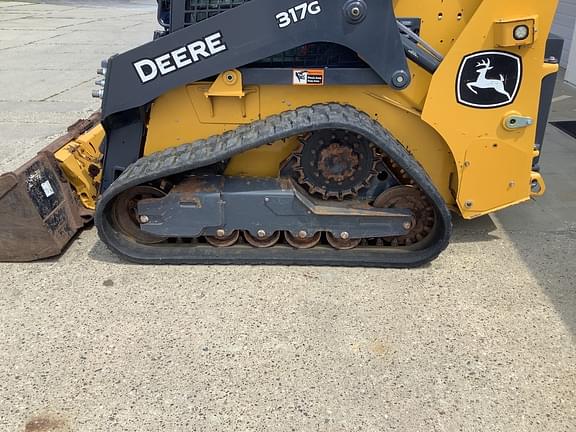 Image of John Deere 317G equipment image 4