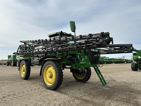 Main image John Deere 412R 1