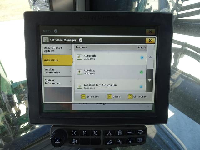 Image of John Deere 412R equipment image 4