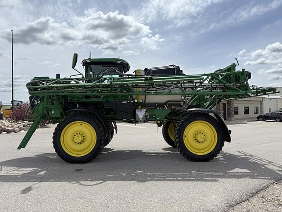 Image of John Deere 412R equipment image 1