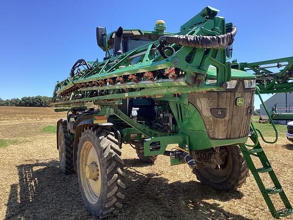 Image of John Deere 412R equipment image 4