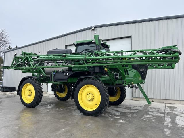 Image of John Deere 412R equipment image 1