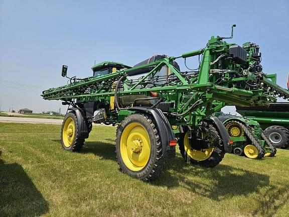 Image of John Deere 412R equipment image 4