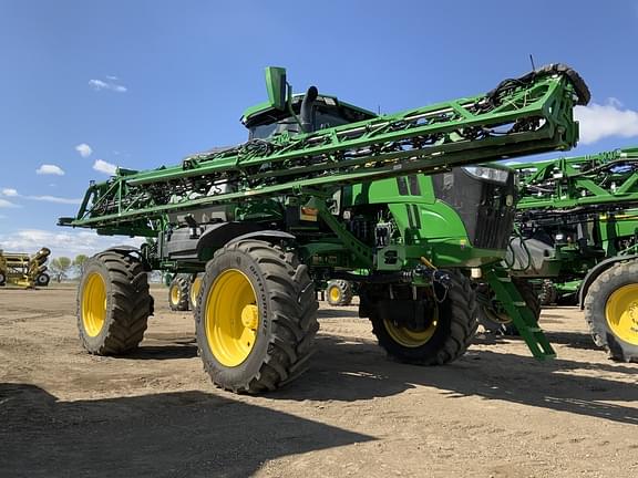 Image of John Deere 412R equipment image 1