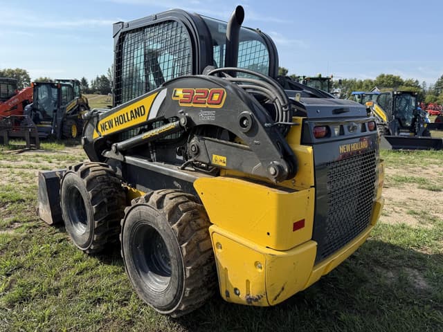 Image of New Holland L320 equipment image 4