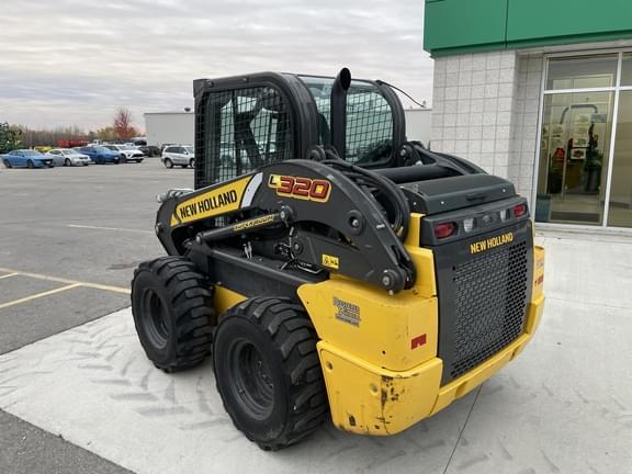 Image of New Holland L320 equipment image 4