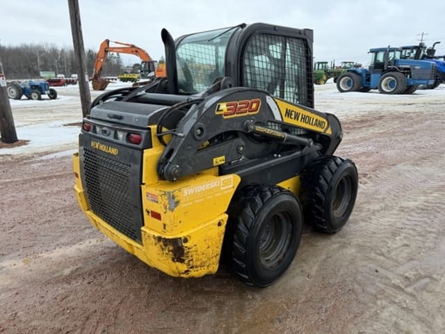 Image of New Holland L320 equipment image 4
