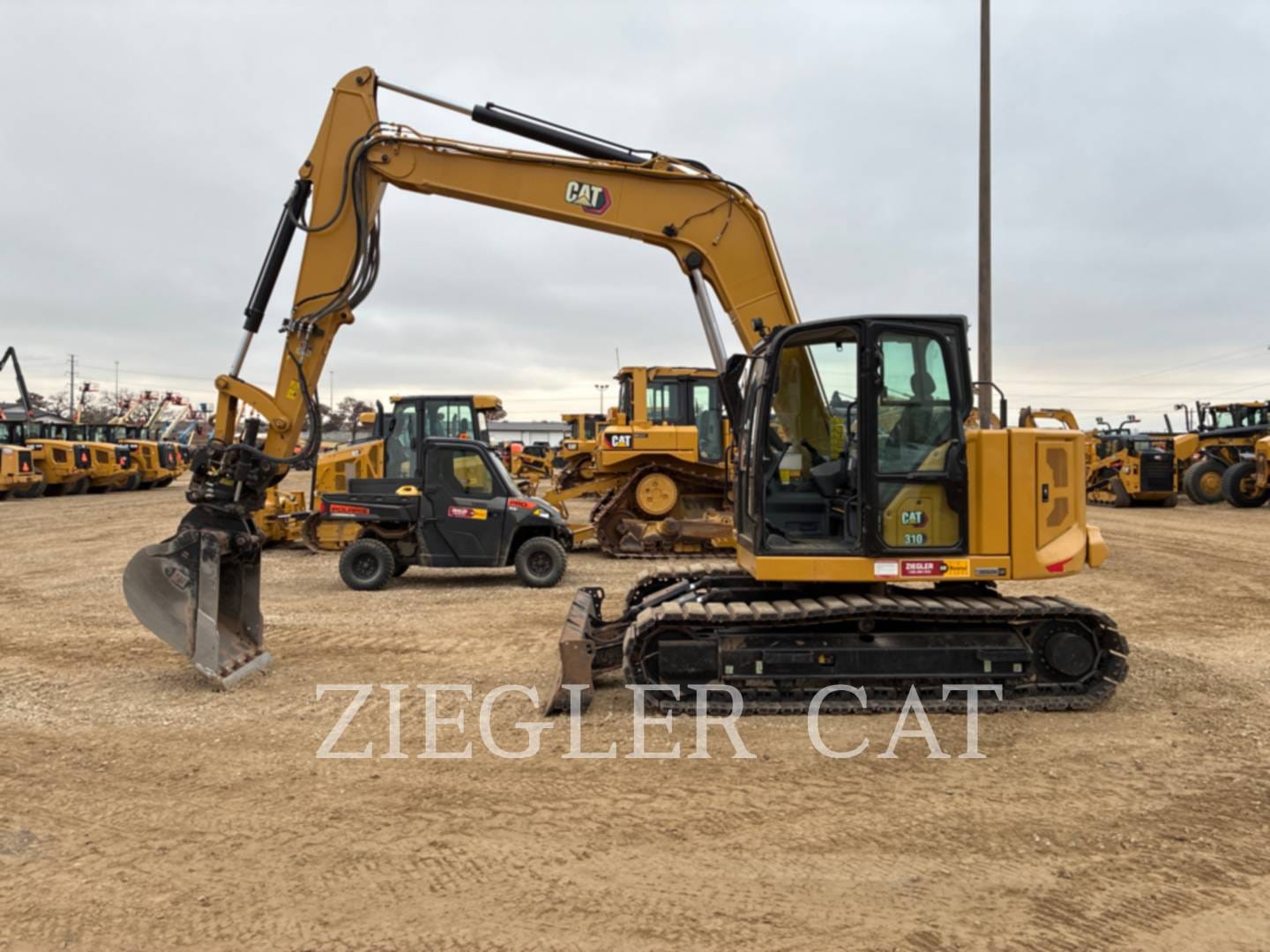 2022 Caterpillar 310 Equipment Image0