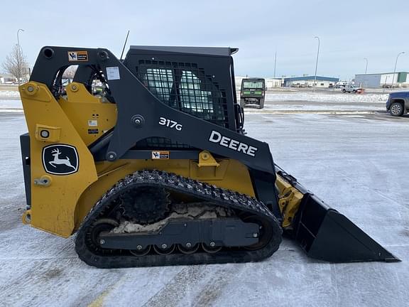 Image of John Deere 317G equipment image 4