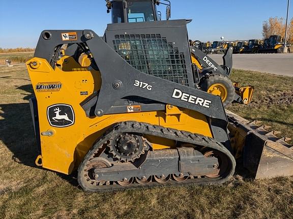 Image of John Deere 317G equipment image 4