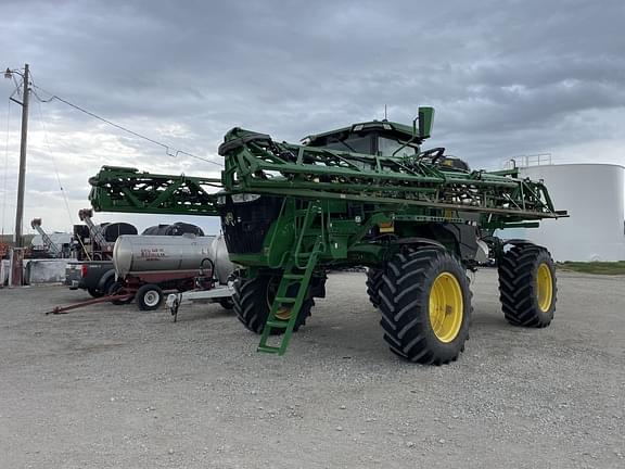 Image of John Deere 412R equipment image 1