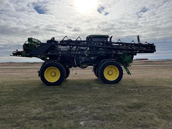 Image of John Deere 412R equipment image 4