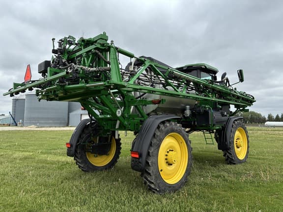 Image of John Deere 412R equipment image 4